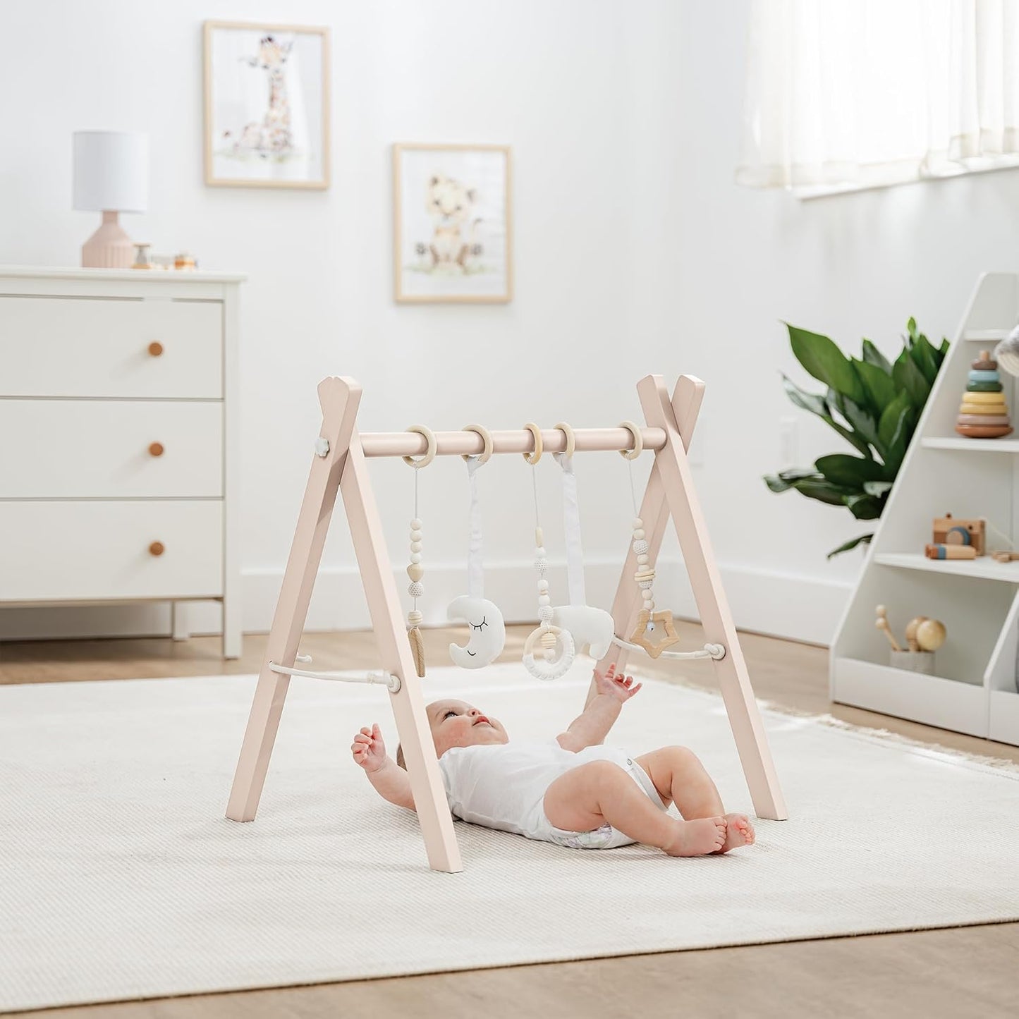Comfy Cubs Wooden Baby Play Gym - Natural Finish Pinewood Baby Activity Gym with 5 Sensory Hanging Toys - Easy No-Tool Assembly, Safe and Durable for Infant Motor and Visual Development - Blush